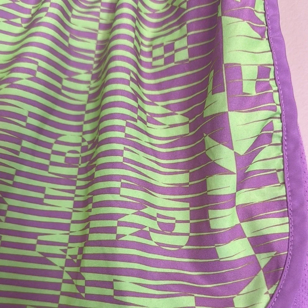 Nike Purple and Green Athletic Shorts with Dynamic Design